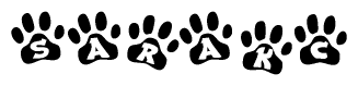 The image shows a series of animal paw prints arranged in a horizontal line. Each paw print contains a letter, and together they spell out the word Sarakc.