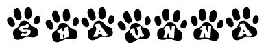 The image shows a row of animal paw prints, each containing a letter. The letters spell out the word Shaunna within the paw prints.