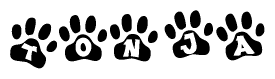 The image shows a row of animal paw prints, each containing a letter. The letters spell out the word Tonja within the paw prints.