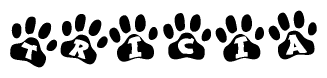 The image shows a series of animal paw prints arranged horizontally. Within each paw print, there's a letter; together they spell Tricia