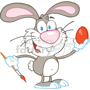 little bunny with a red egg clipart.