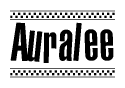 The image is a black and white clipart of the text Auralee in a bold, italicized font. The text is bordered by a dotted line on the top and bottom, and there are checkered flags positioned at both ends of the text, usually associated with racing or finishing lines.