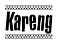 The image is a black and white clipart of the text Kareng in a bold, italicized font. The text is bordered by a dotted line on the top and bottom, and there are checkered flags positioned at both ends of the text, usually associated with racing or finishing lines.