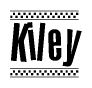 The image is a black and white clipart of the text Kiley in a bold, italicized font. The text is bordered by a dotted line on the top and bottom, and there are checkered flags positioned at both ends of the text, usually associated with racing or finishing lines.