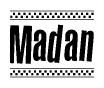 The image contains the text Madan in a bold, stylized font, with a checkered flag pattern bordering the top and bottom of the text.