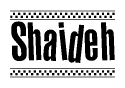 The image is a black and white clipart of the text Shaideh in a bold, italicized font. The text is bordered by a dotted line on the top and bottom, and there are checkered flags positioned at both ends of the text, usually associated with racing or finishing lines.
