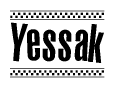 The image is a black and white clipart of the text Yessak in a bold, italicized font. The text is bordered by a dotted line on the top and bottom, and there are checkered flags positioned at both ends of the text, usually associated with racing or finishing lines.
