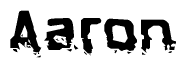This nametag says Aaron, and has a static looking effect at the bottom of the words. The words are in a stylized font.