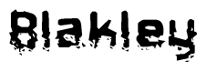 This nametag says Blakley, and has a static looking effect at the bottom of the words. The words are in a stylized font.