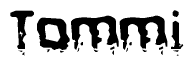 The image contains the word Tommi in a stylized font with a static looking effect at the bottom of the words