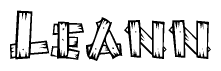 The image contains the name Leann written in a decorative, stylized font with a hand-drawn appearance. The lines are made up of what appears to be planks of wood, which are nailed together