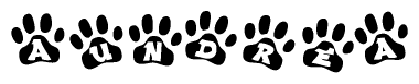 The image shows a series of animal paw prints arranged horizontally. Within each paw print, there's a letter; together they spell Aundrea
