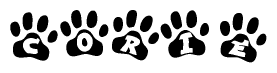 The image shows a row of animal paw prints, each containing a letter. The letters spell out the word Corie within the paw prints.