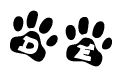 The image shows a row of animal paw prints, each containing a letter. The letters spell out the word De within the paw prints.