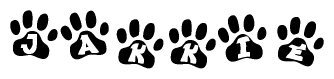 The image shows a series of animal paw prints arranged horizontally. Within each paw print, there's a letter; together they spell Jakkie