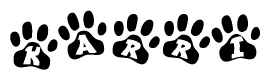 The image shows a series of animal paw prints arranged horizontally. Within each paw print, there's a letter; together they spell Karri