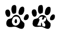 The image shows a series of animal paw prints arranged horizontally. Within each paw print, there's a letter; together they spell Ok
