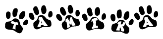 The image shows a series of animal paw prints arranged horizontally. Within each paw print, there's a letter; together they spell Tamika