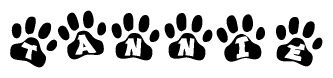 The image shows a series of animal paw prints arranged in a horizontal line. Each paw print contains a letter, and together they spell out the word Tannie.