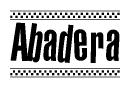 The image is a black and white clipart of the text Abadera in a bold, italicized font. The text is bordered by a dotted line on the top and bottom, and there are checkered flags positioned at both ends of the text, usually associated with racing or finishing lines.