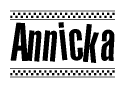 The image is a black and white clipart of the text Annicka in a bold, italicized font. The text is bordered by a dotted line on the top and bottom, and there are checkered flags positioned at both ends of the text, usually associated with racing or finishing lines.