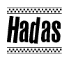 The image is a black and white clipart of the text Hadas in a bold, italicized font. The text is bordered by a dotted line on the top and bottom, and there are checkered flags positioned at both ends of the text, usually associated with racing or finishing lines.