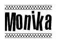 The clipart image displays the text Monika in a bold, stylized font. It is enclosed in a rectangular border with a checkerboard pattern running below and above the text, similar to a finish line in racing. 