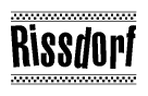 The image is a black and white clipart of the text Rissdorf in a bold, italicized font. The text is bordered by a dotted line on the top and bottom, and there are checkered flags positioned at both ends of the text, usually associated with racing or finishing lines.
