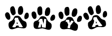 The image shows a series of animal paw prints arranged horizontally. Within each paw print, there's a letter; together they spell Anya