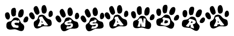 The image shows a row of animal paw prints, each containing a letter. The letters spell out the word Cassandra within the paw prints.