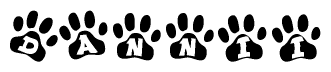 The image shows a row of animal paw prints, each containing a letter. The letters spell out the word Dannii within the paw prints.