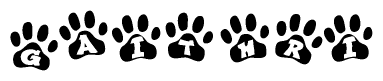The image shows a series of animal paw prints arranged horizontally. Within each paw print, there's a letter; together they spell Gaithri
