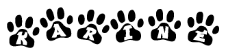 The image shows a row of animal paw prints, each containing a letter. The letters spell out the word Karine within the paw prints.