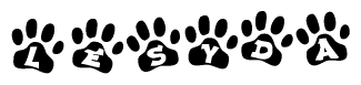 The image shows a series of animal paw prints arranged in a horizontal line. Each paw print contains a letter, and together they spell out the word Lesyda.