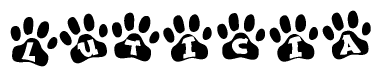 The image shows a series of animal paw prints arranged in a horizontal line. Each paw print contains a letter, and together they spell out the word Luticia.