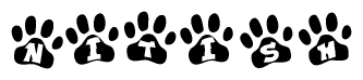 The image shows a row of animal paw prints, each containing a letter. The letters spell out the word Nitish within the paw prints.