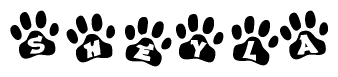 The image shows a series of animal paw prints arranged horizontally. Within each paw print, there's a letter; together they spell Sheyla