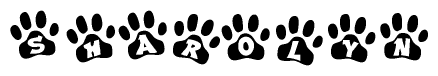 The image shows a series of animal paw prints arranged in a horizontal line. Each paw print contains a letter, and together they spell out the word Sharolyn.