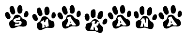 The image shows a series of animal paw prints arranged in a horizontal line. Each paw print contains a letter, and together they spell out the word Shakana.