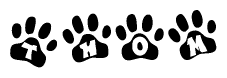The image shows a row of animal paw prints, each containing a letter. The letters spell out the word Thom within the paw prints.