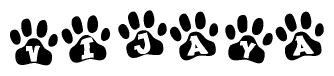 The image shows a row of animal paw prints, each containing a letter. The letters spell out the word Vijaya within the paw prints.