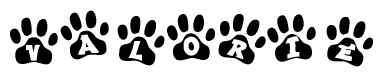 The image shows a row of animal paw prints, each containing a letter. The letters spell out the word Valorie within the paw prints.