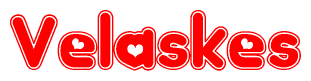 The image displays the word Velaskes written in a stylized red font with hearts inside the letters.