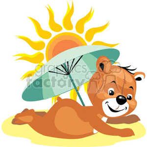 Teddy bear at the beach under an umbrella