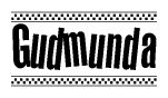 The image is a black and white clipart of the text Gudmunda in a bold, italicized font. The text is bordered by a dotted line on the top and bottom, and there are checkered flags positioned at both ends of the text, usually associated with racing or finishing lines.