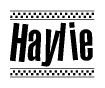 The image is a black and white clipart of the text Haylie in a bold, italicized font. The text is bordered by a dotted line on the top and bottom, and there are checkered flags positioned at both ends of the text, usually associated with racing or finishing lines.