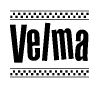 The image is a black and white clipart of the text Velma in a bold, italicized font. The text is bordered by a dotted line on the top and bottom, and there are checkered flags positioned at both ends of the text, usually associated with racing or finishing lines.