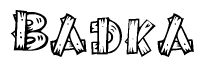 The image contains the name Badka written in a decorative, stylized font with a hand-drawn appearance. The lines are made up of what appears to be planks of wood, which are nailed together