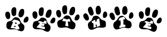 The image shows a row of animal paw prints, each containing a letter. The letters spell out the word Bethie within the paw prints.