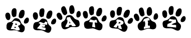 The image shows a row of animal paw prints, each containing a letter. The letters spell out the word Beatriz within the paw prints.